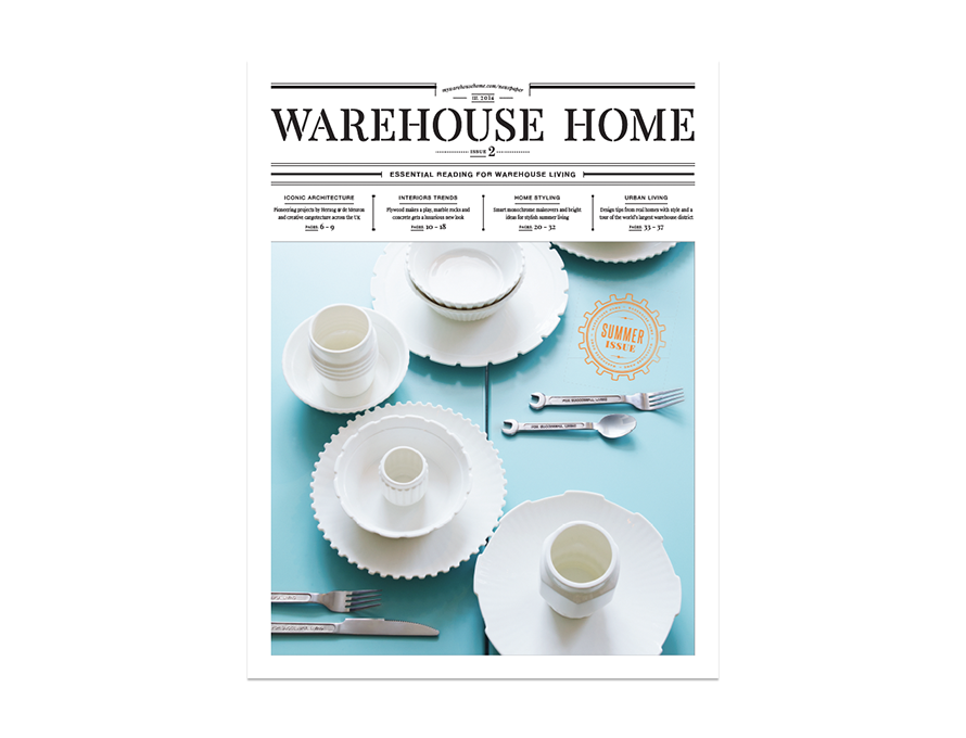 Warehouse Home interior design magazine Issue Two cover features assorted tableware on a blue wooden table